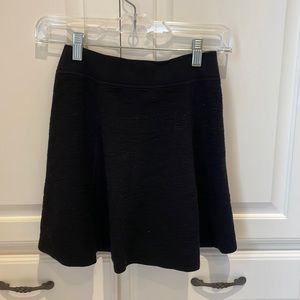 Theory size P modest skater skirt. Solid black with panels. Very good condition.